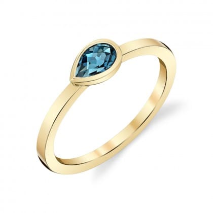 pear shaped blue topaz ring
